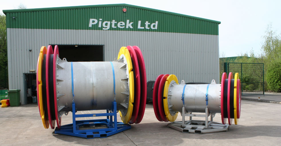 Pigtek, the Pipeline Pigging experts stood along side the largest manufactured Pig.
